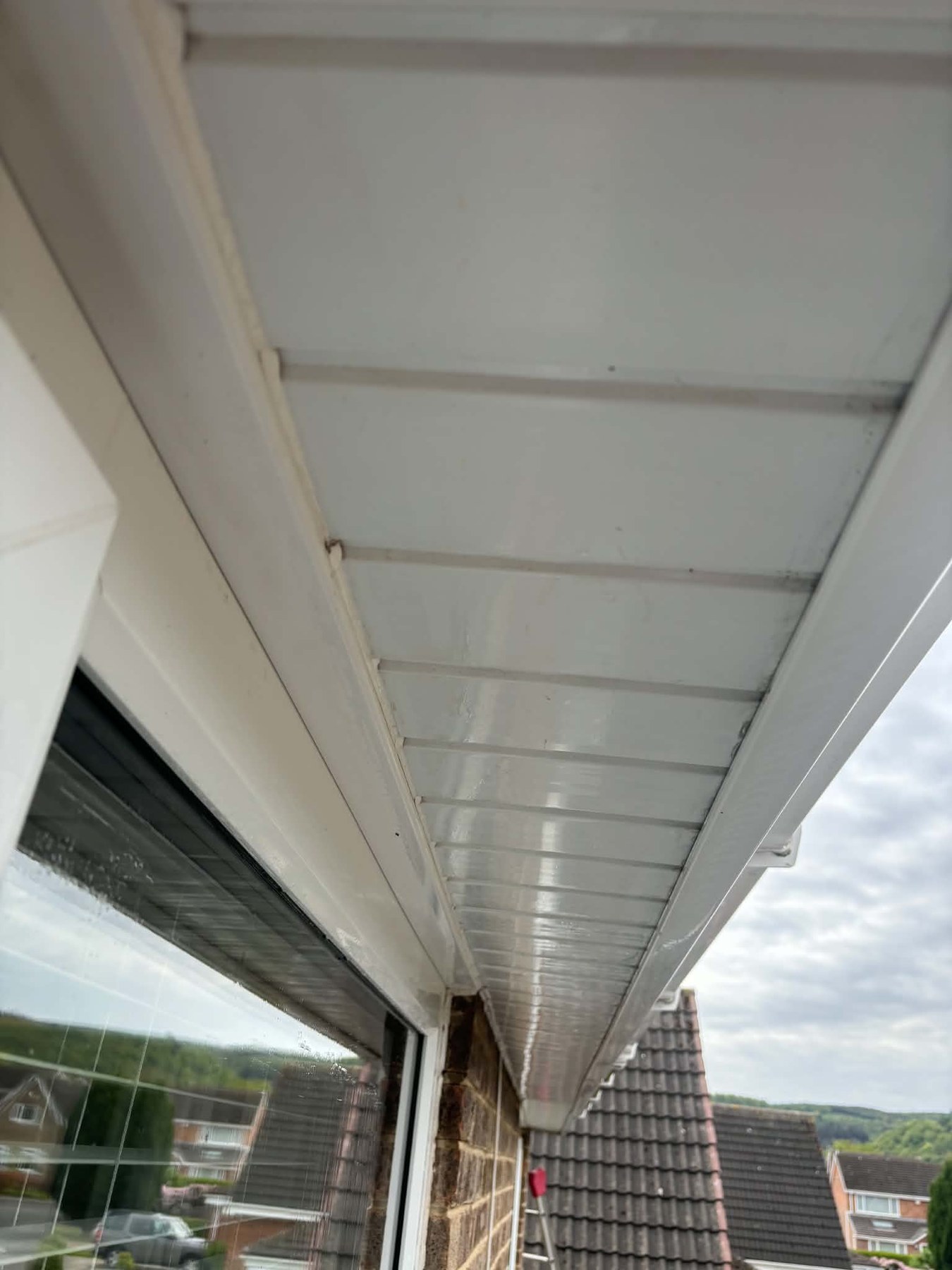 After — Soffits scrubbed back to bright white