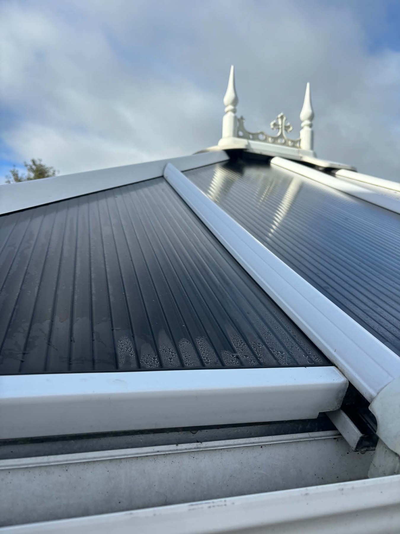 Conservatory roof panels washed and rinsed clean