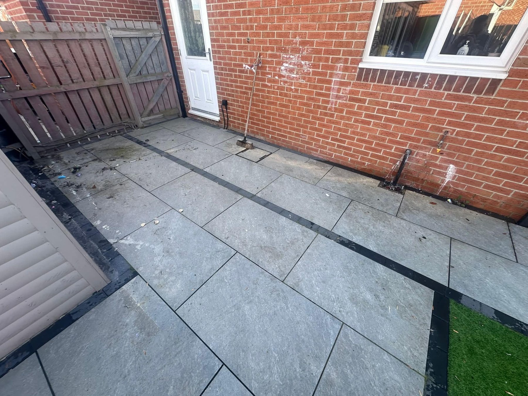 The same patio before we arrived - muck, debris and all