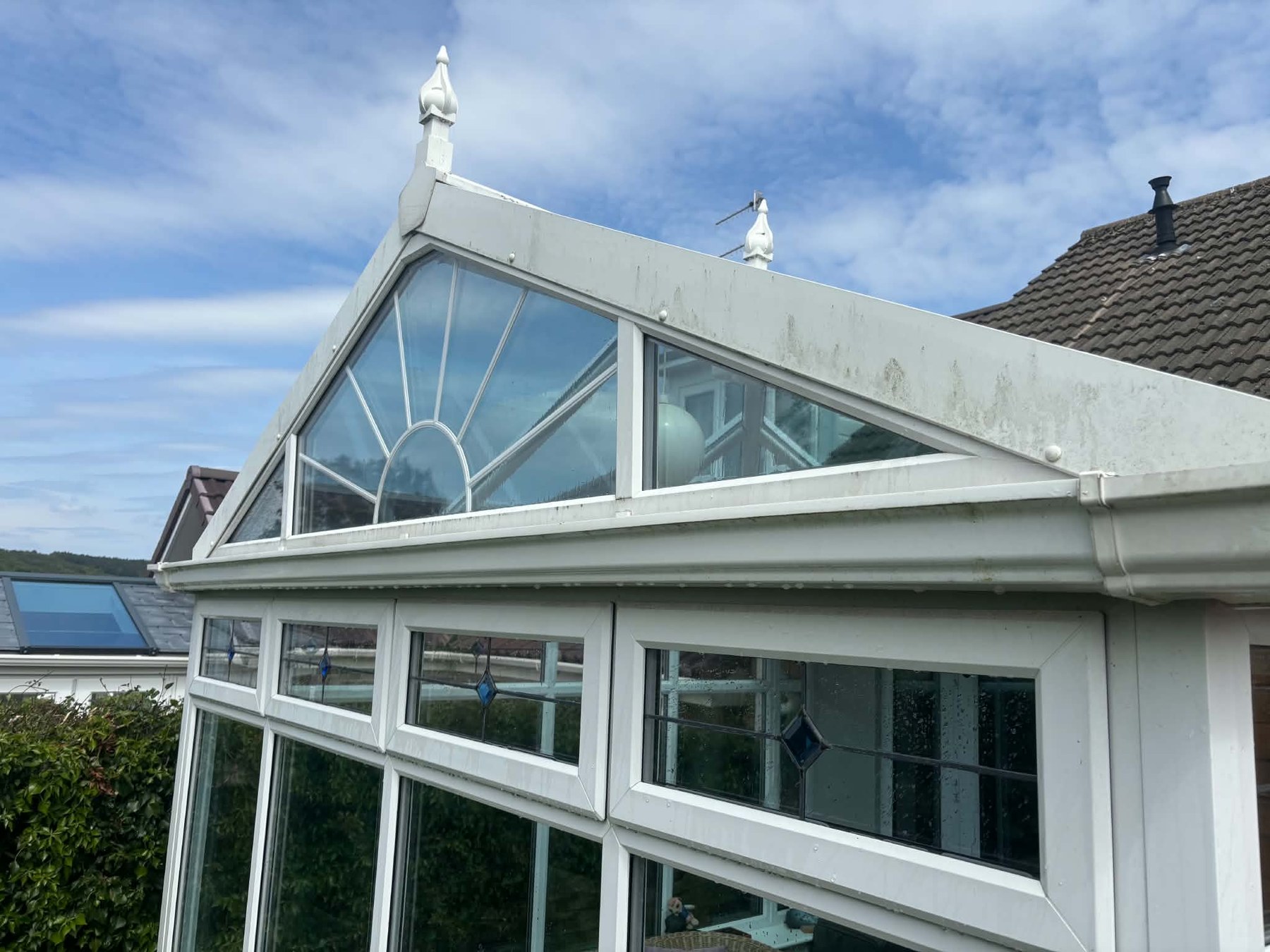 Before: a conservatory roofline turned green - exactly the kind of job we love