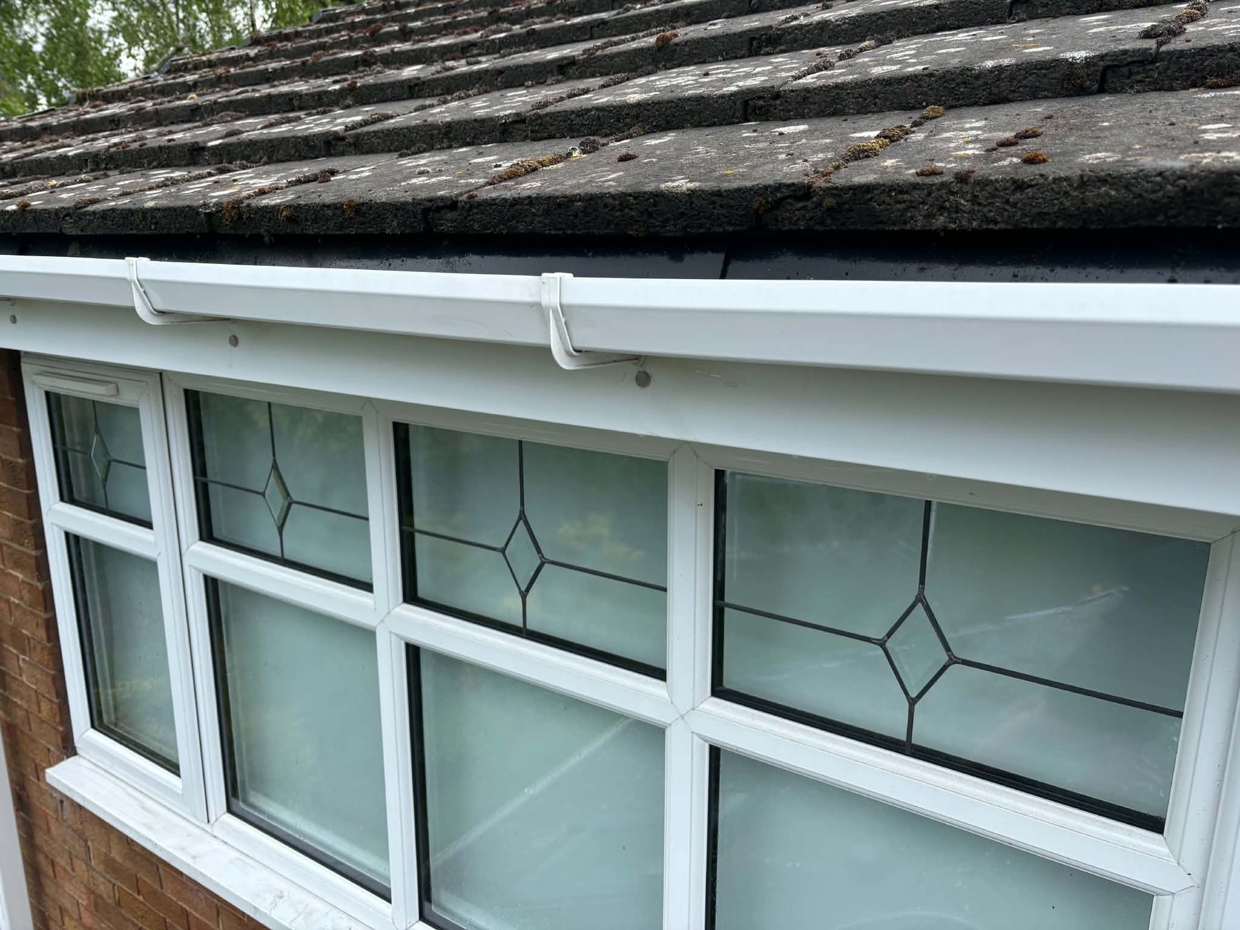 After — Gutter runs scrubbed clean - no more green streaks