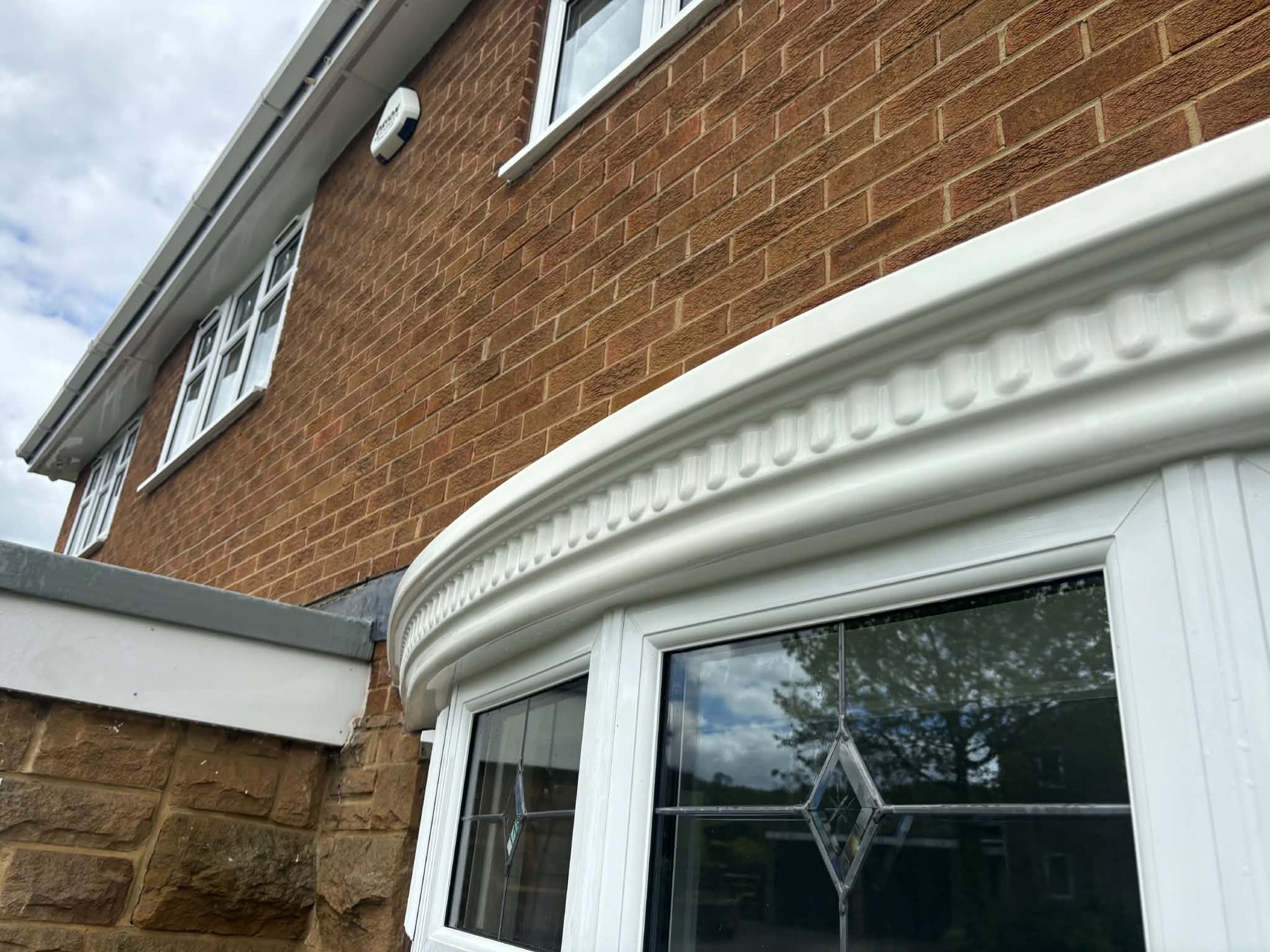 Bay windows and roofline brightened